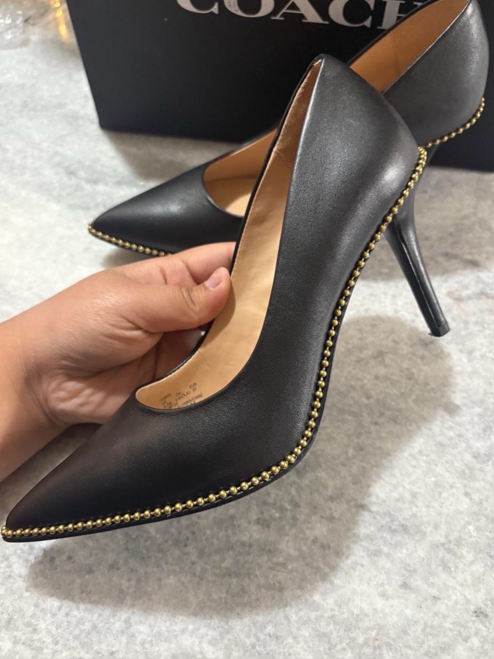 Coach black leather pointed toe pumps with gold studs size US 6.5